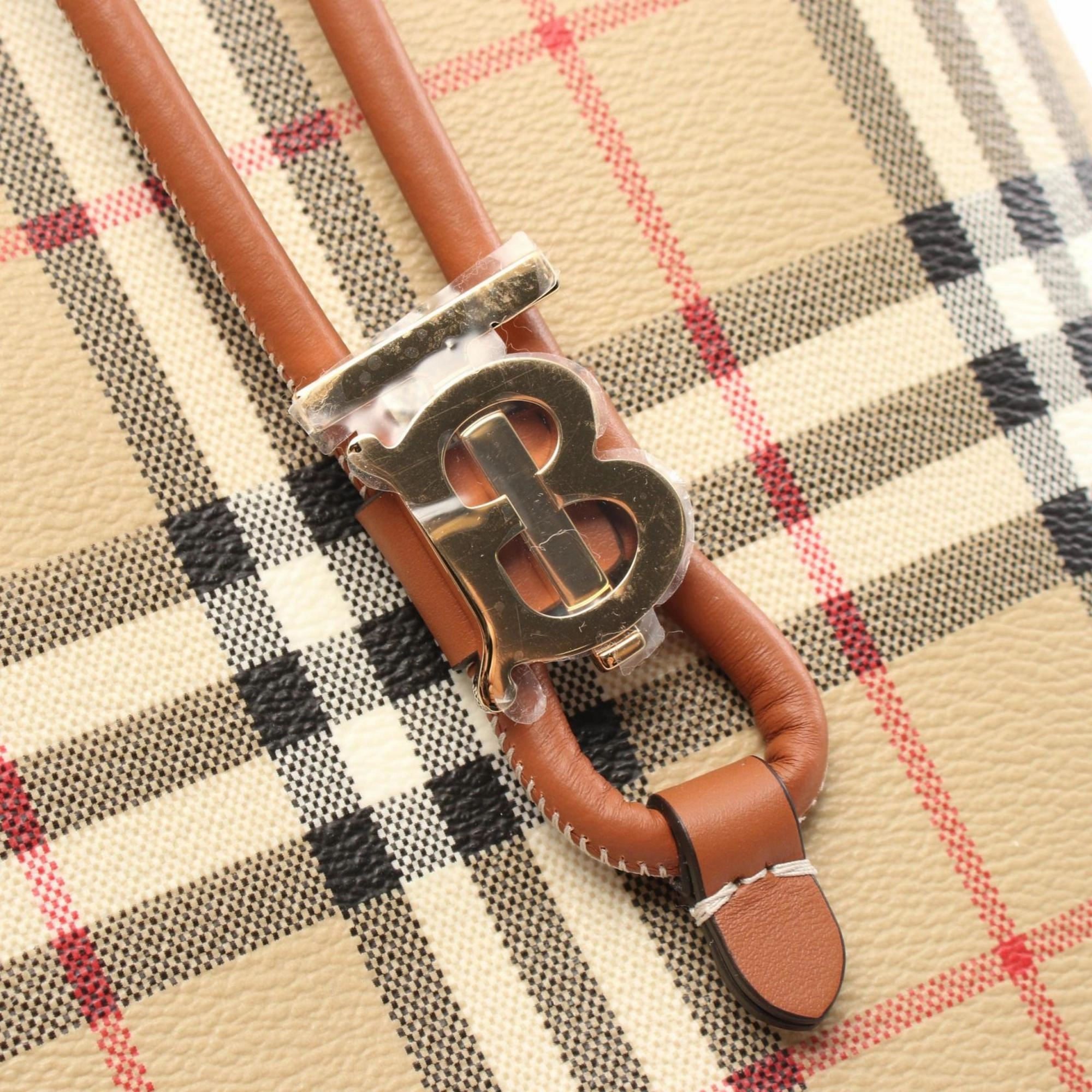 Burberry   Coated Canvas Leather Handbag