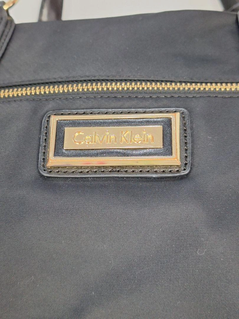 Calvin Klein Everyday Stylish Black and Gold Bag