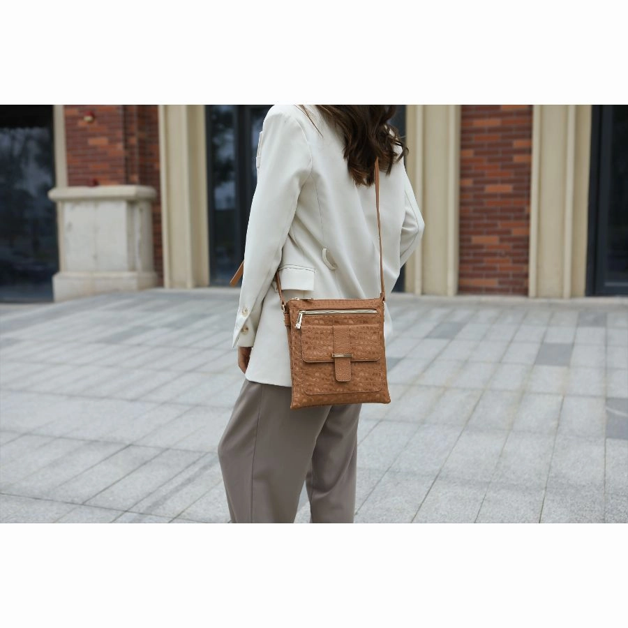 Janni Signature Embossed Crossbody Bag