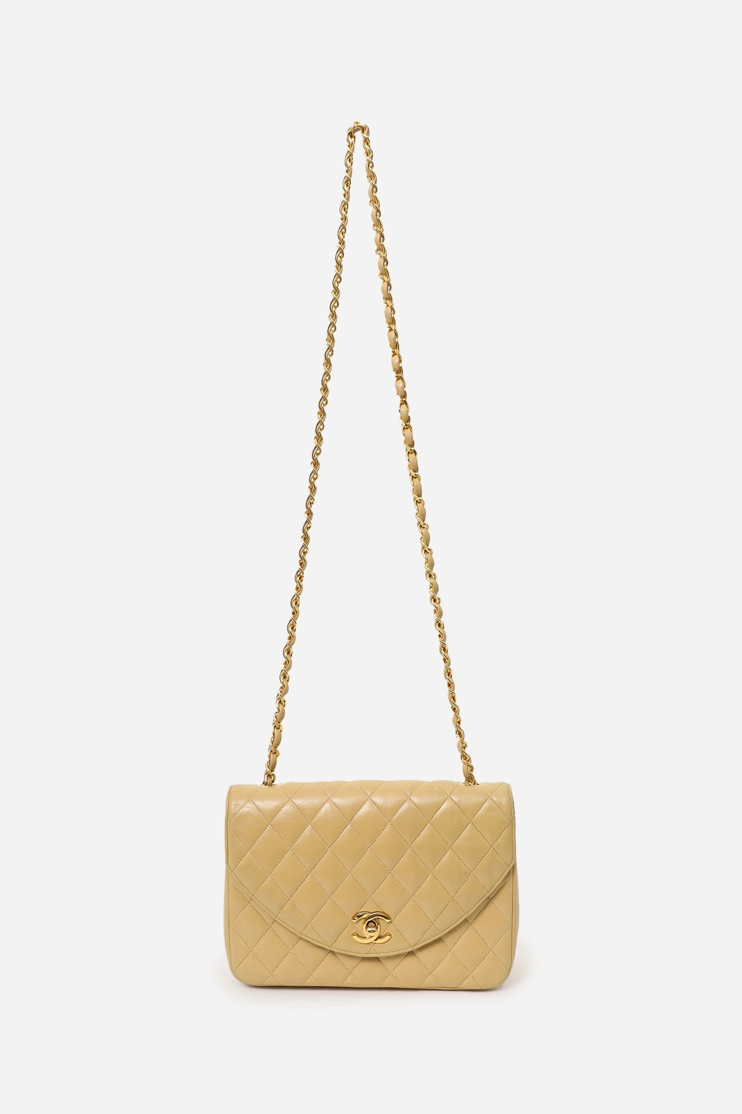 Pre-Loved Chanel 1986-88 Beige Quilted Lambskin Half Moon Flap Bag