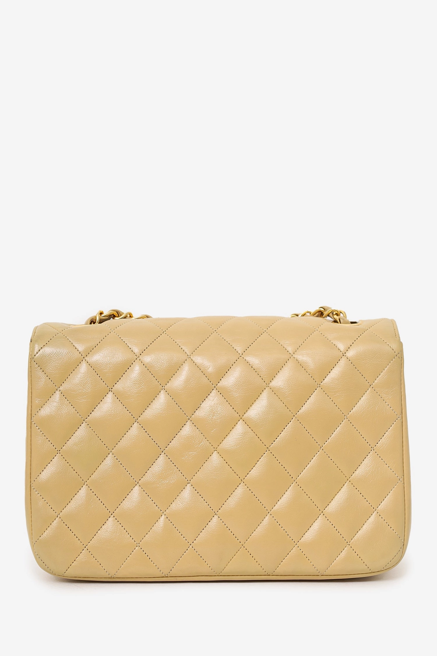 Pre-Loved Chanel 1986-88 Beige Quilted Lambskin Half Moon Flap Bag