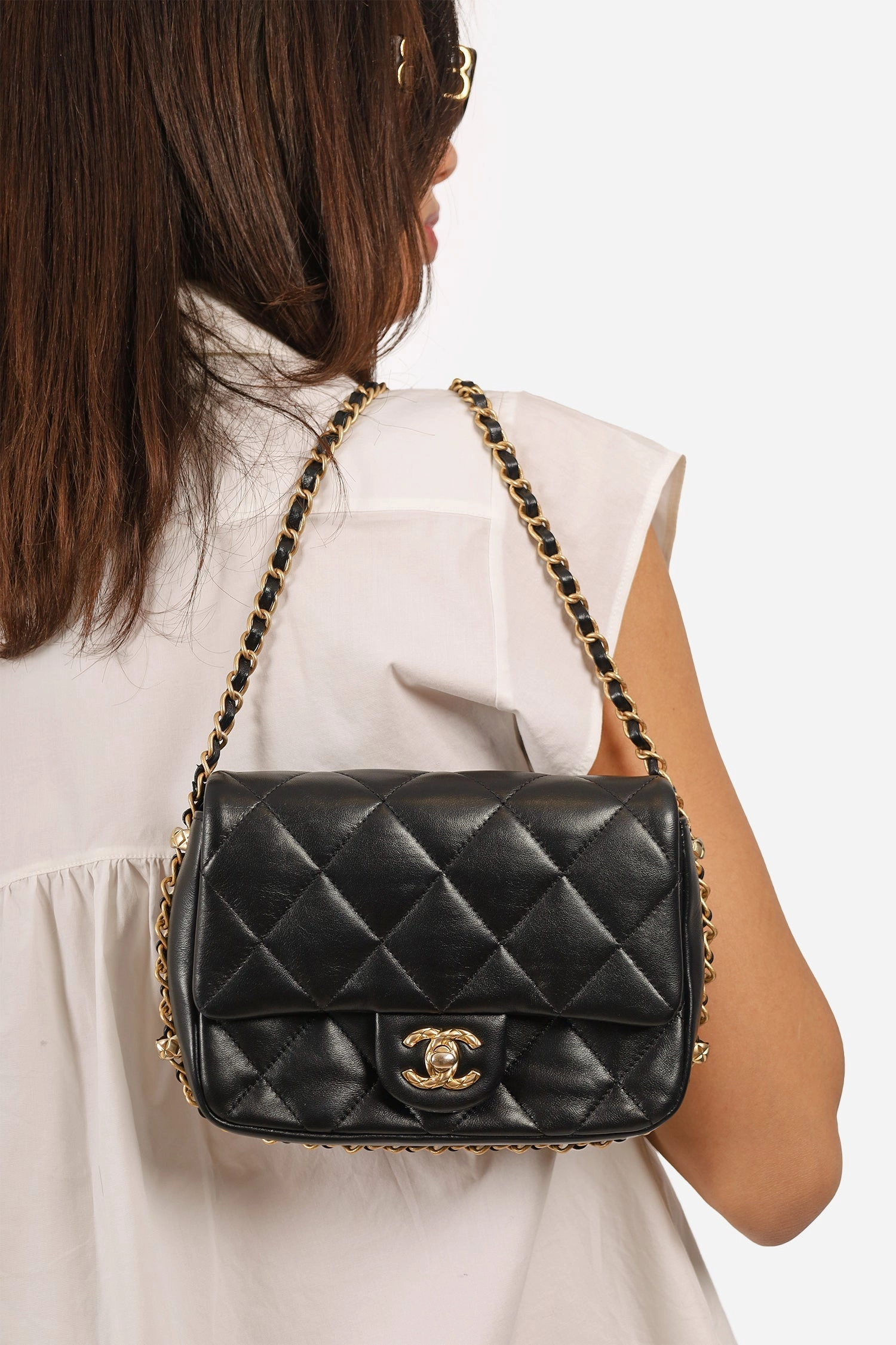 Pre-Loved Chanel 2023 Black Quilted Lambskin Chain Around Mini Square Flap Bag