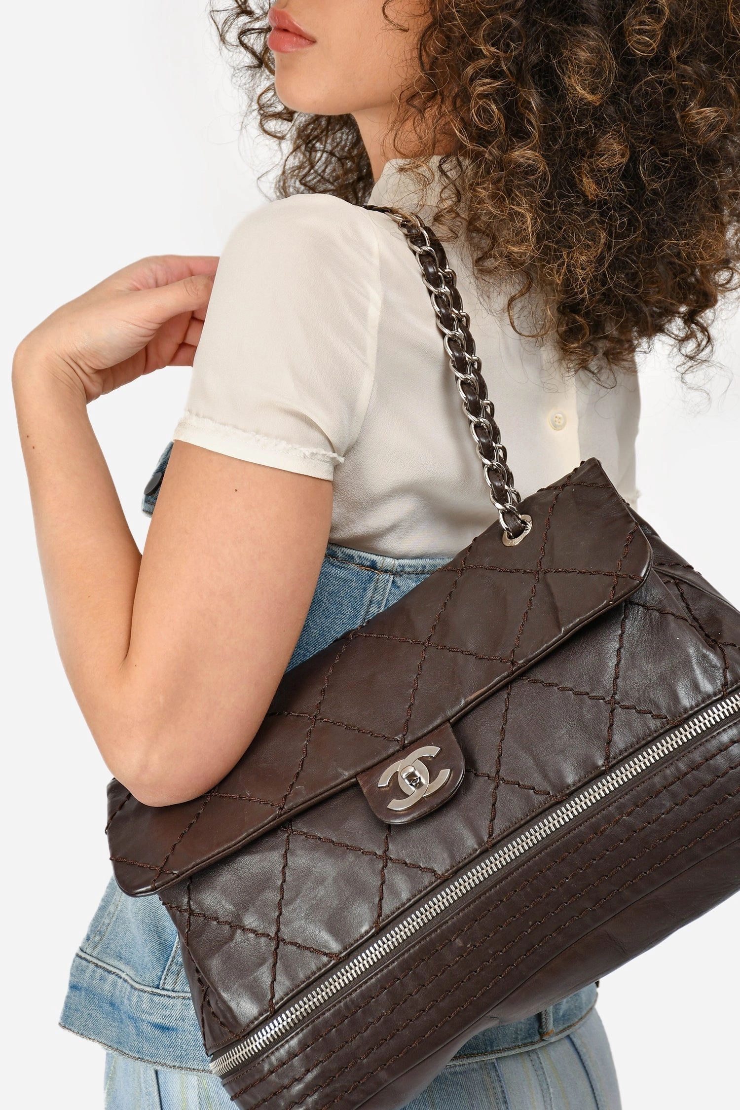 Pre-loved Chanel Brown Leather Expandable Ligne Flap Bag (As Is)